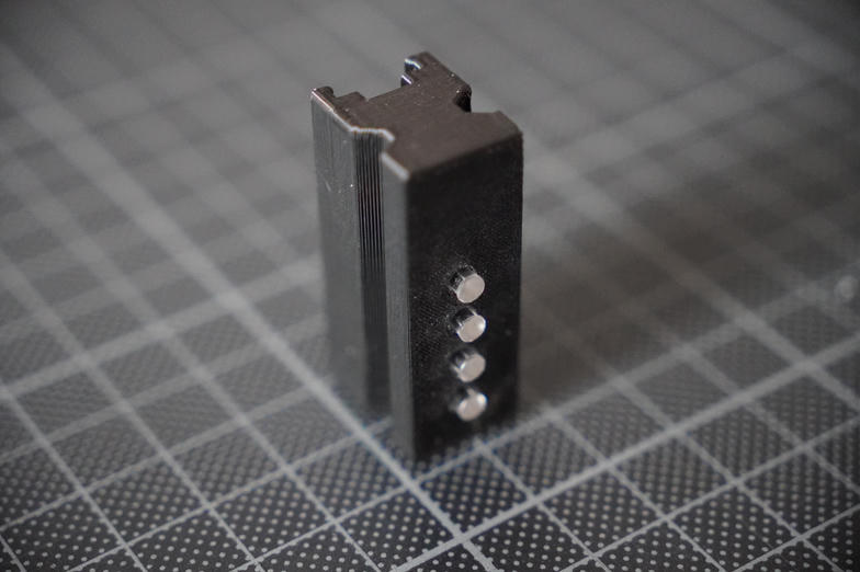 bracket with light pipes inserted