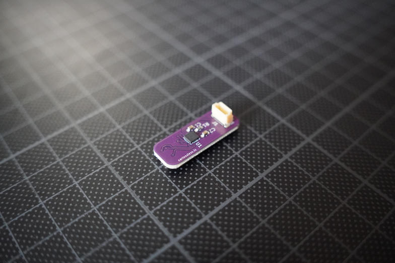 PCB with controller and connector facing upward